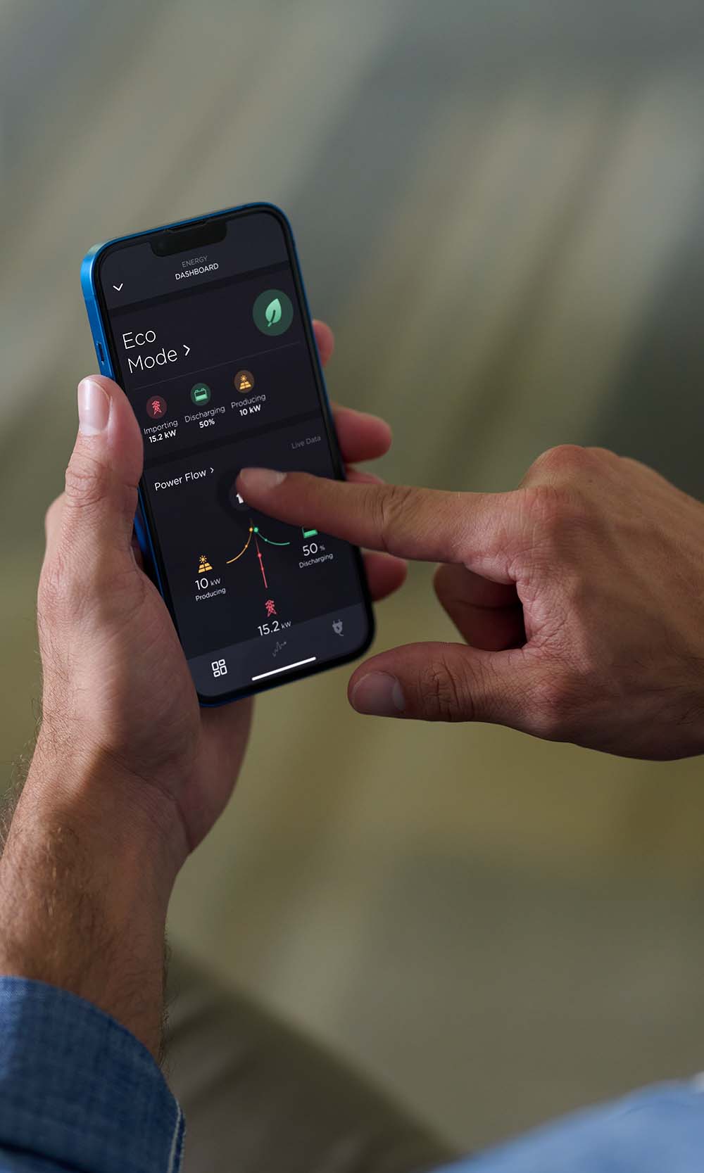 man pointing at something on his cell phone
